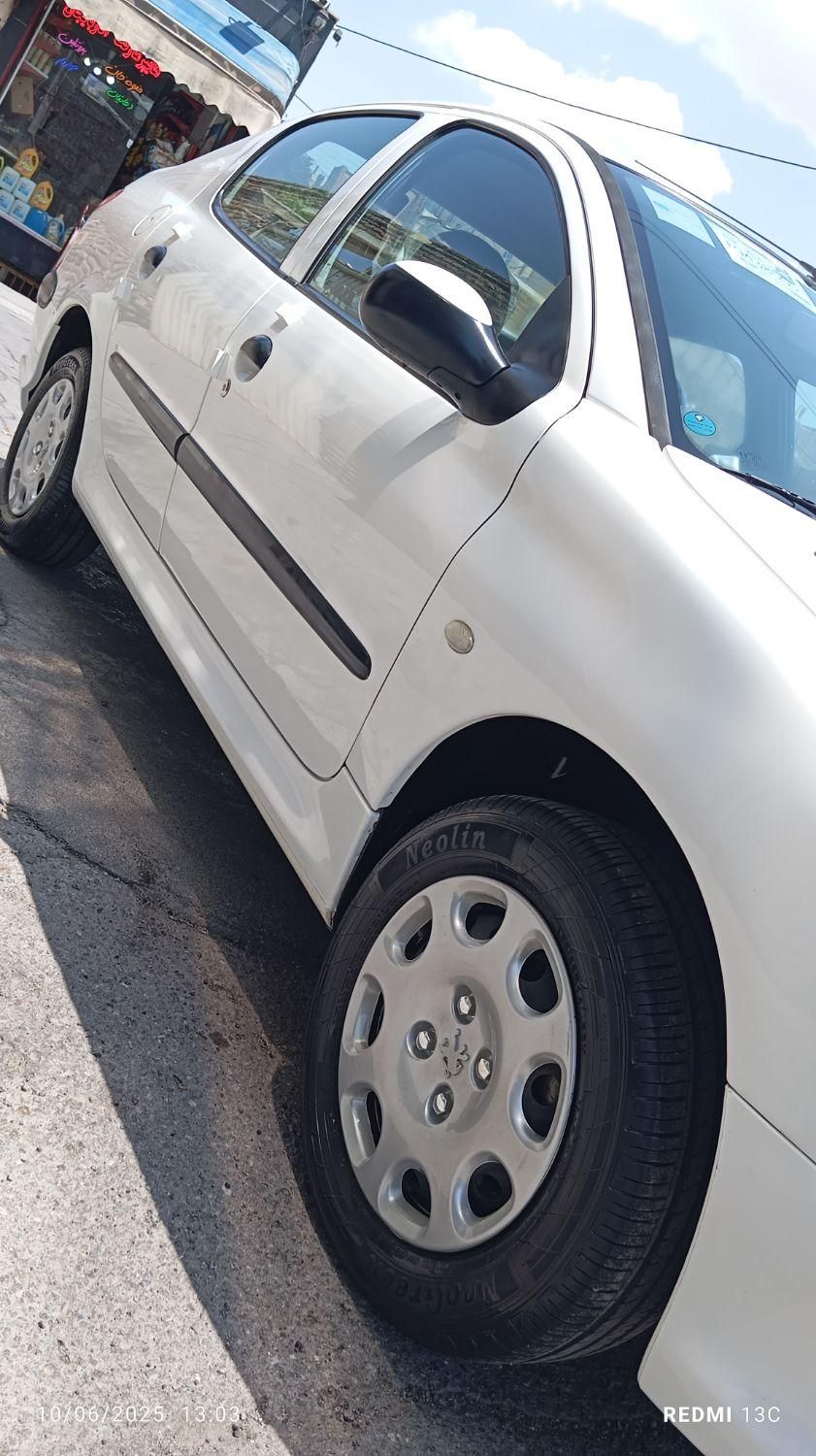 پژو ۲۰۶ صندوق دار v8 - 1396