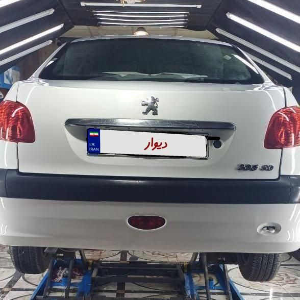 پژو ۲۰۶ صندوق دار v8 - 1391