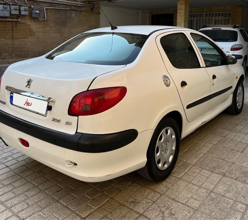 پژو ۲۰۶ صندوق دار v8 - 1395