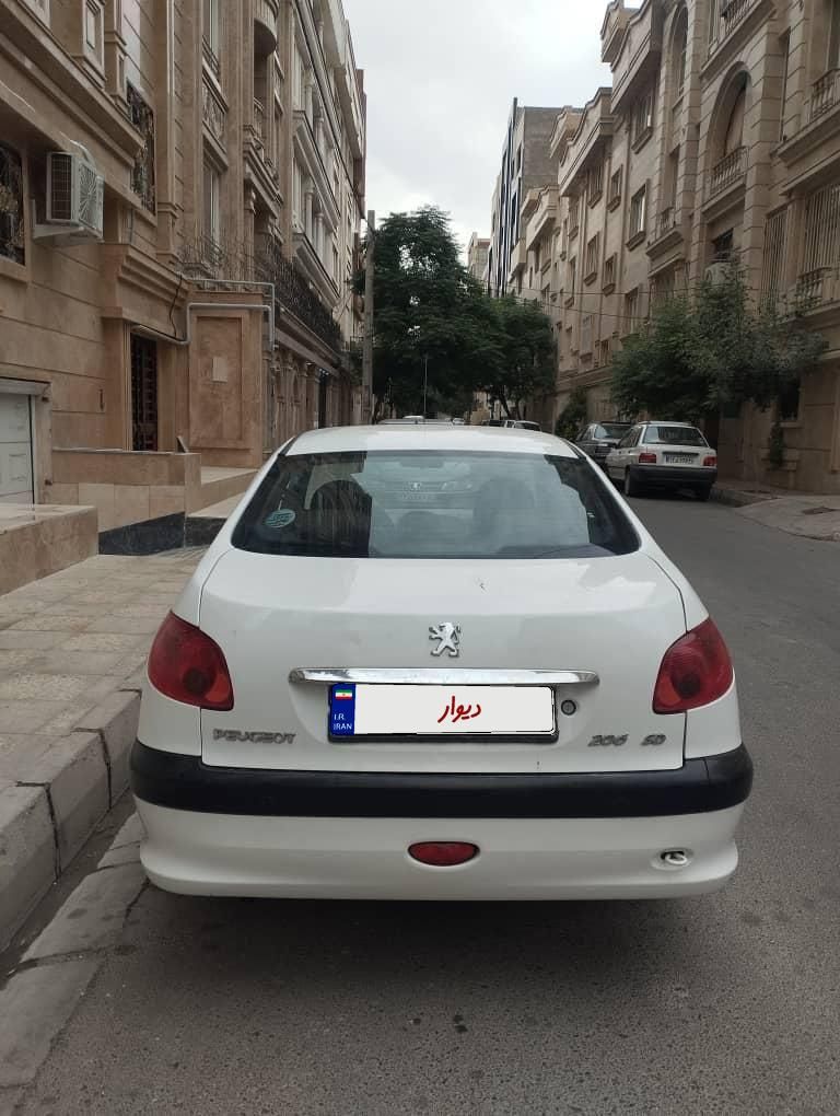 پژو ۲۰۶ صندوق دار v8 - 1396