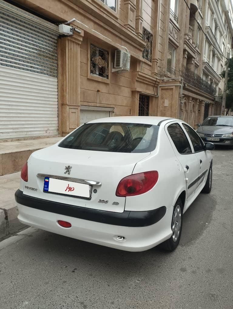 پژو ۲۰۶ صندوق دار v8 - 1396