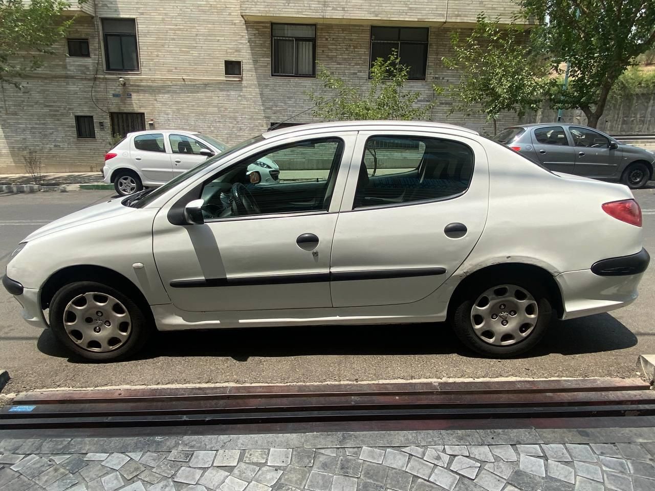 پژو ۲۰۶ صندوق دار v8 - 1394