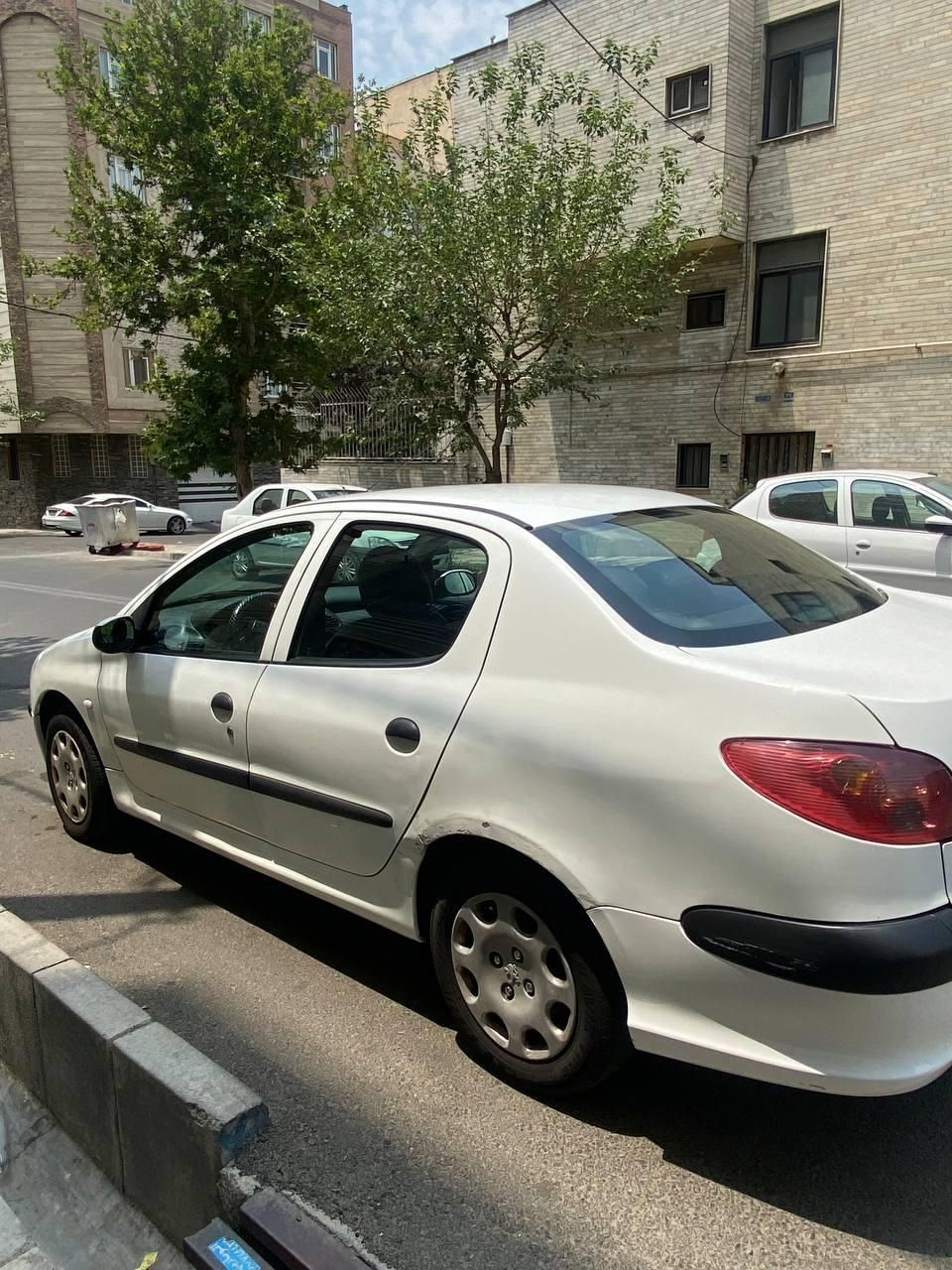 پژو ۲۰۶ صندوق دار v8 - 1394