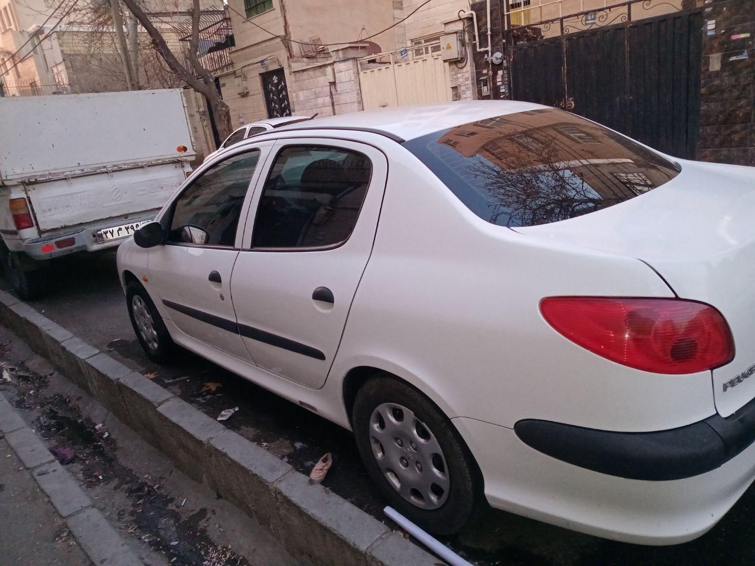 پژو ۲۰۶ صندوق دار v8 - 1395