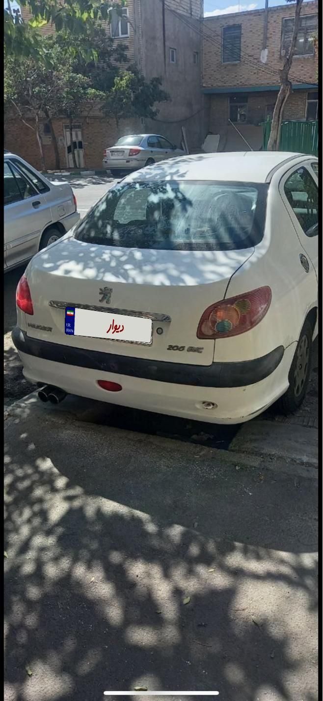 پژو ۲۰۶ صندوق دار v8 - 1392