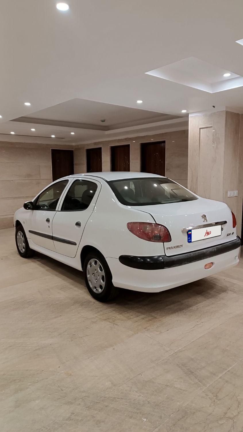 پژو ۲۰۶ صندوق دار v8 - 1390