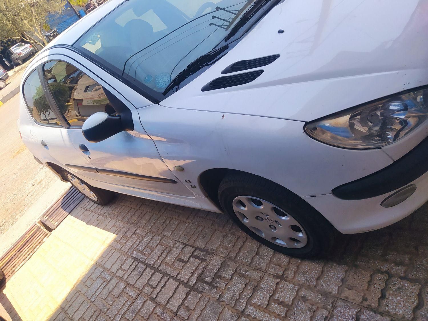 پژو ۲۰۶ صندوق دار v8 - 1390