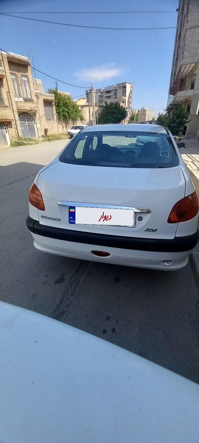 پژو ۲۰۶ صندوق دار v8 - 1394