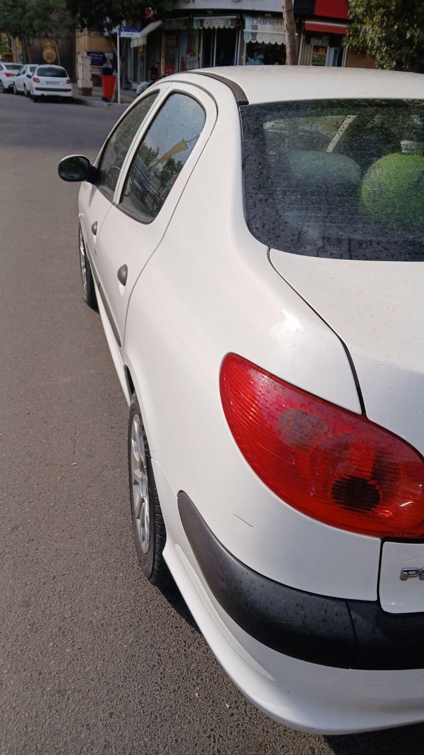 پژو ۲۰۶ صندوق دار v8 - 1399