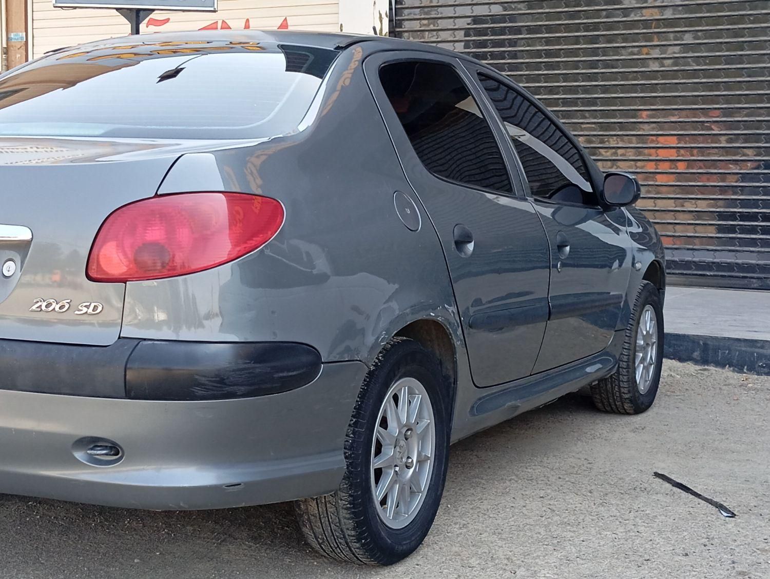 پژو ۲۰۶ صندوق دار v8 - 1392