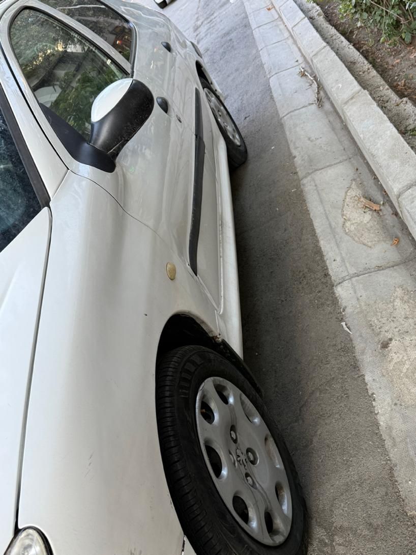 پژو ۲۰۶ صندوق دار v8 - 1394