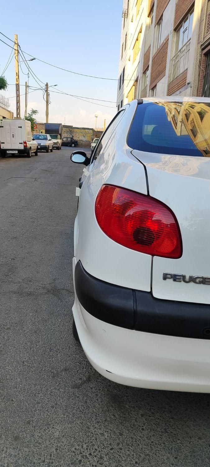 پژو ۲۰۶ صندوق دار v8 - 1395