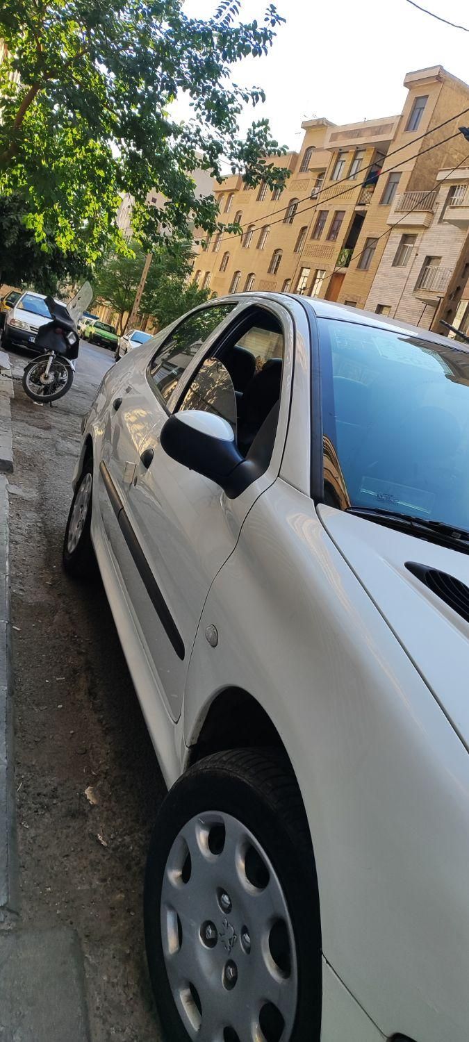 پژو ۲۰۶ صندوق دار v8 - 1395