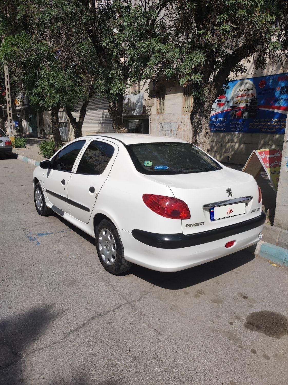 پژو ۲۰۶ صندوق دار v8 - 1399