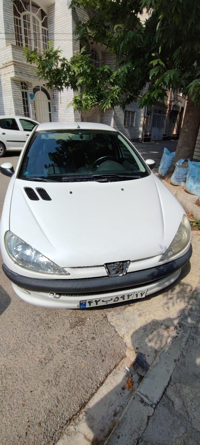 پژو ۲۰۶ صندوق دار v8 - 1396