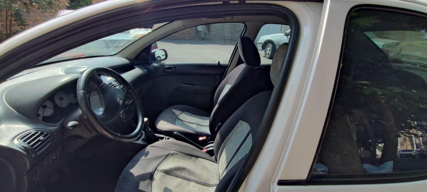 پژو ۲۰۶ صندوق دار v8 - 1396