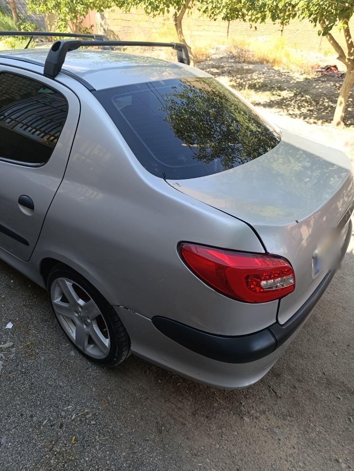 پژو ۲۰۶ صندوق دار v20 - 1391