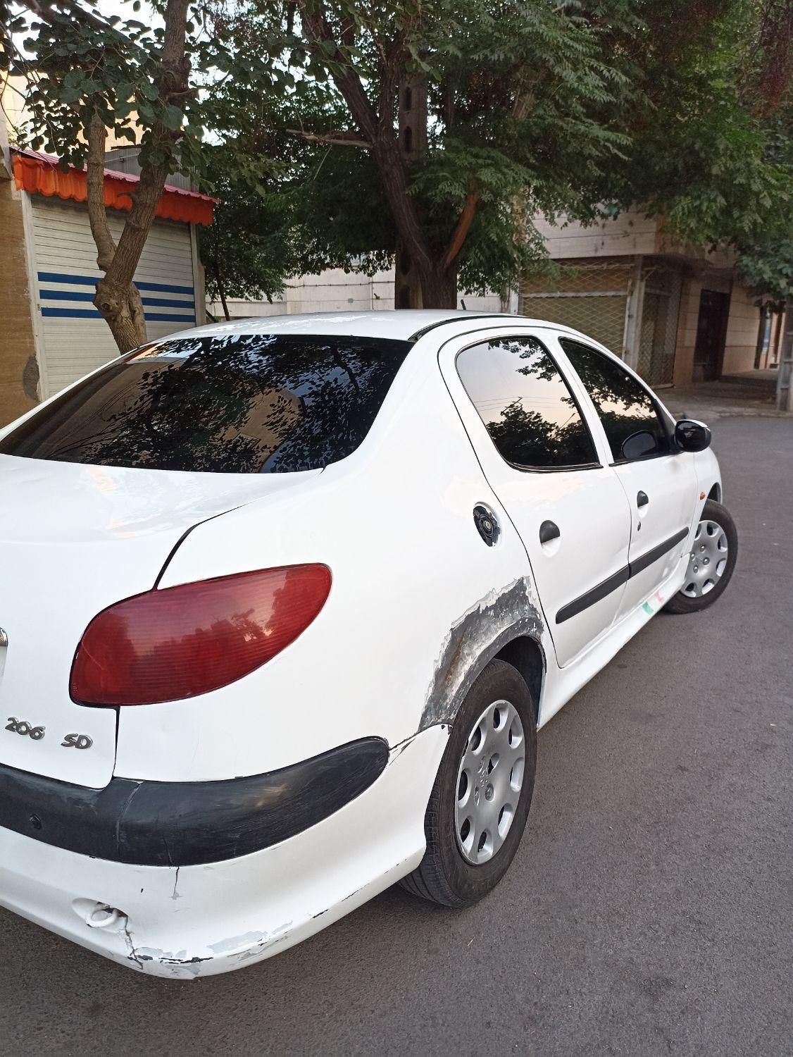 پژو ۲۰۶ صندوق دار v8 - 1391