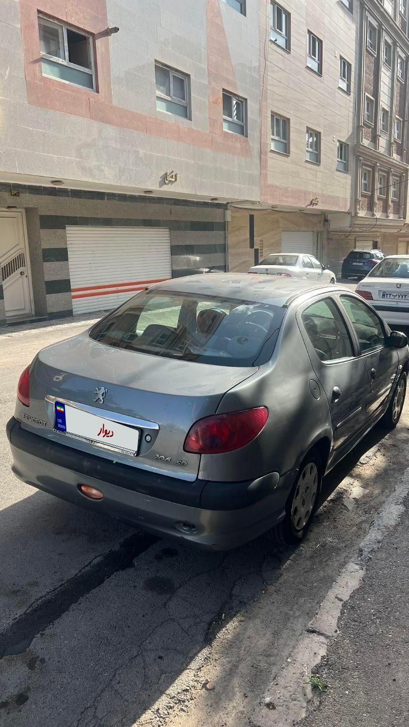 پژو ۲۰۶ صندوق دار v8 - 1389