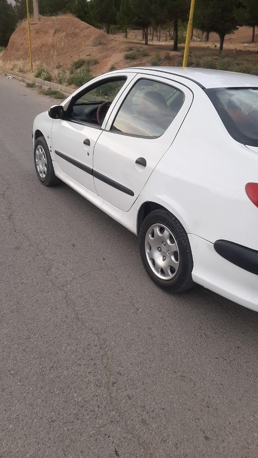 پژو ۲۰۶ صندوق دار v8 - 1396