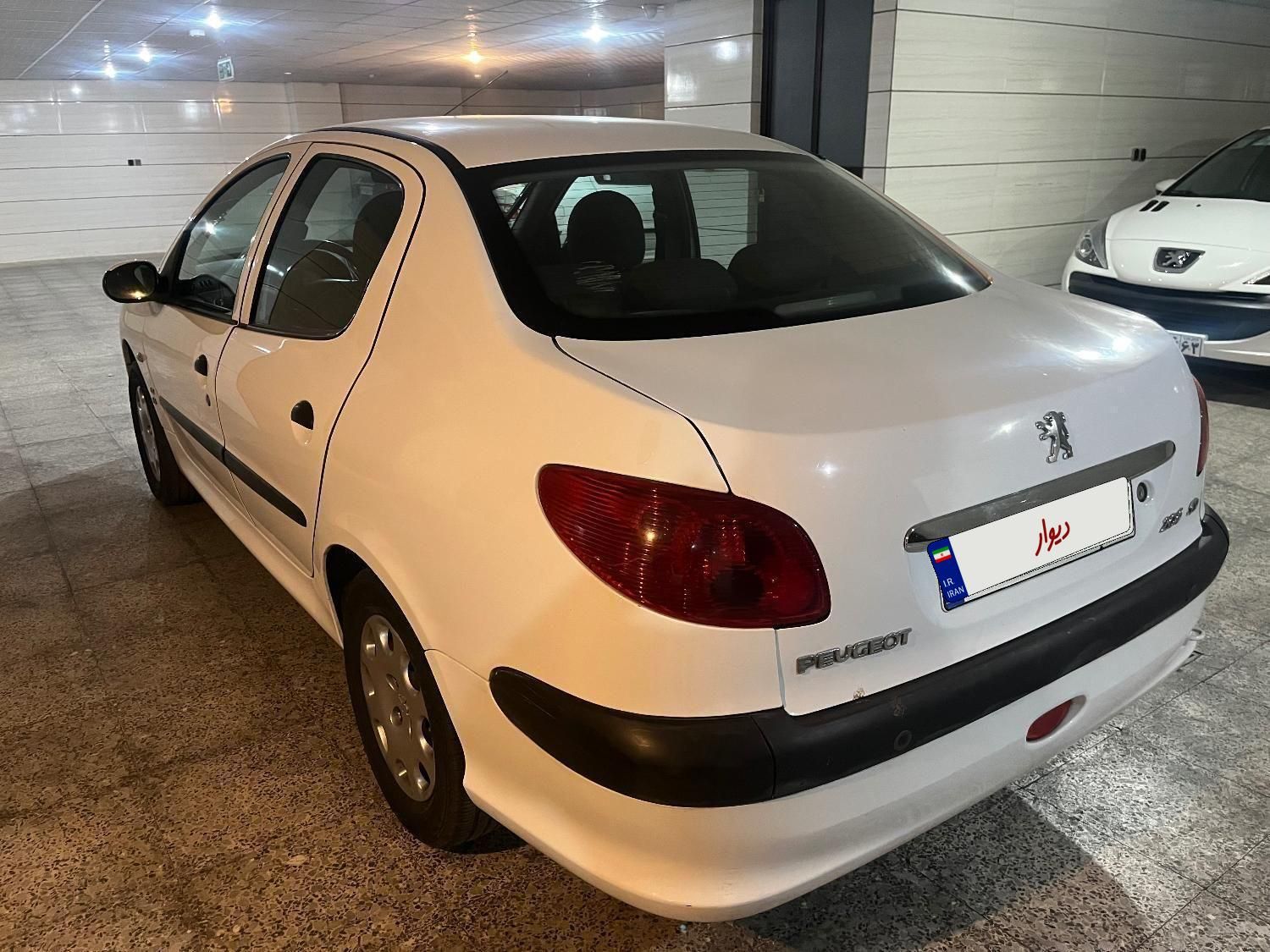 پژو ۲۰۶ صندوق دار v8 - 1397