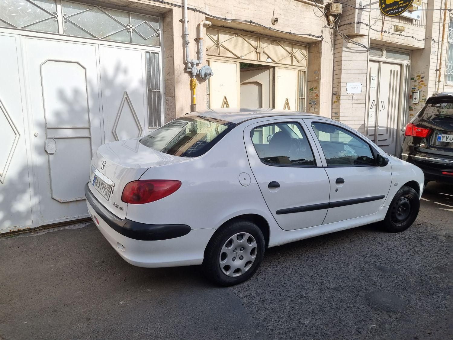 پژو ۲۰۶ صندوق دار v8 - 1396