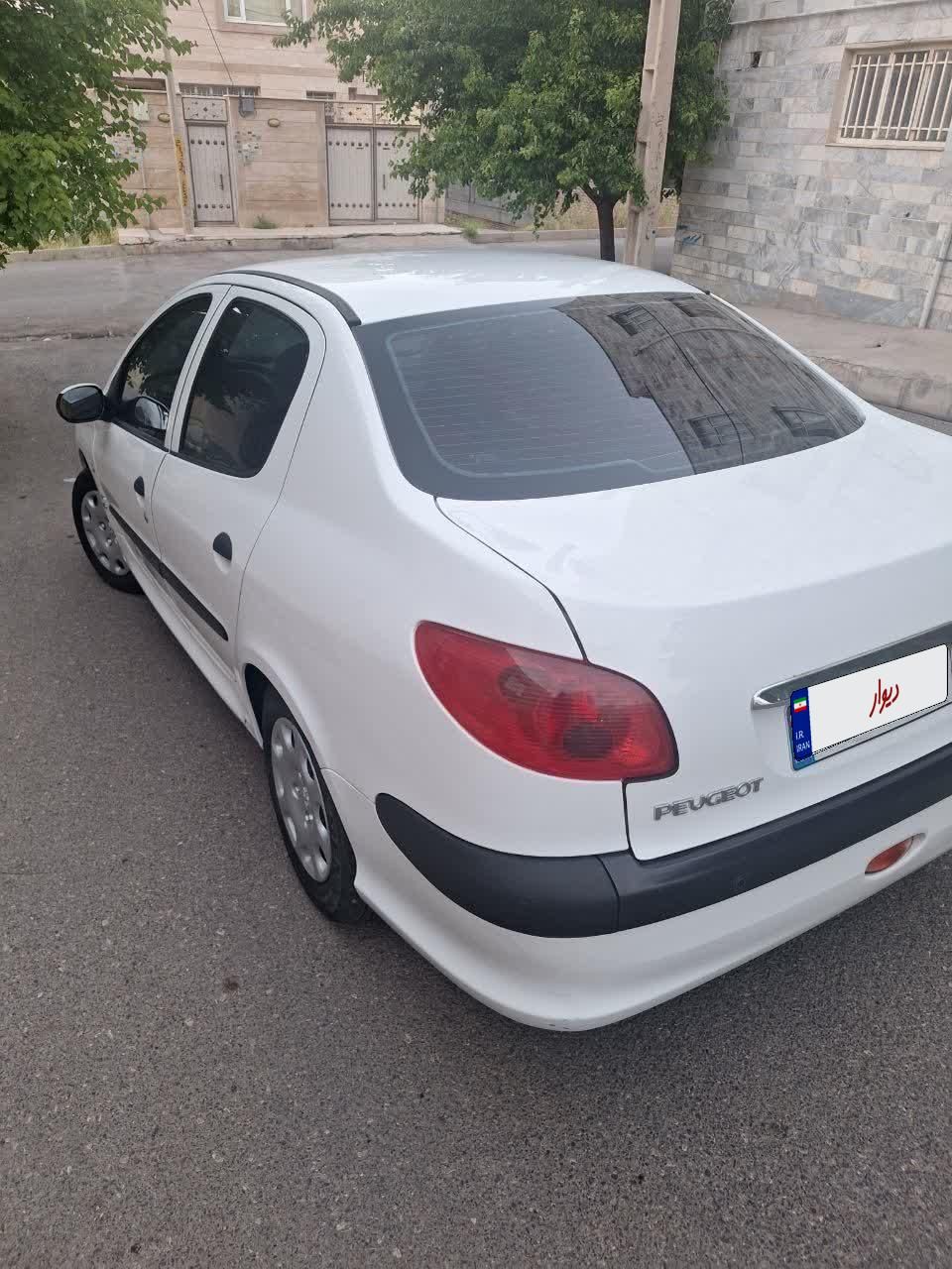 پژو ۲۰۶ صندوق دار v8 - 1396
