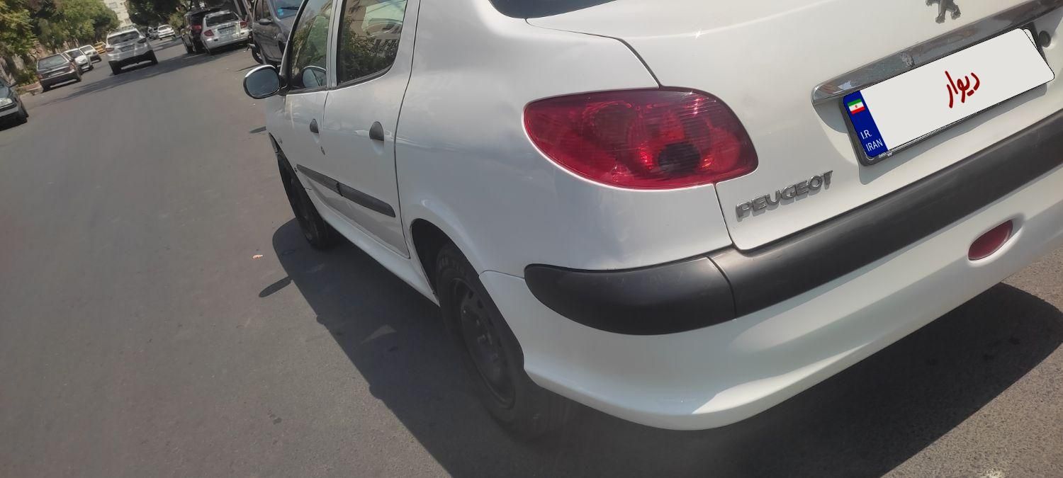 پژو ۲۰۶ صندوق دار v8 - 1390