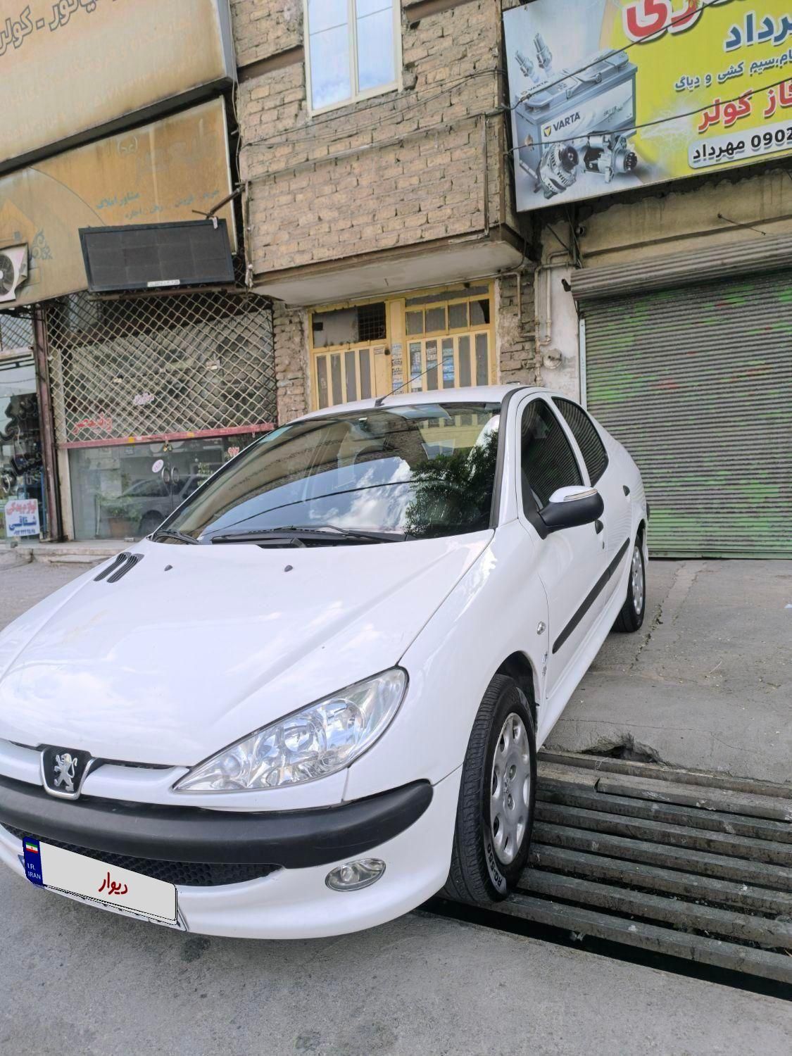 پژو ۲۰۶ صندوق دار v8 - 1396