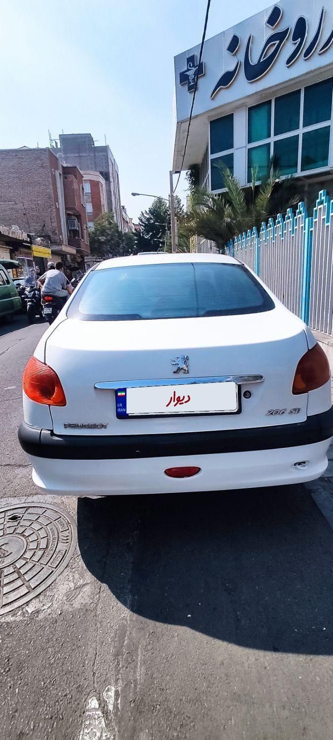 پژو ۲۰۶ صندوق دار v8 - 1392