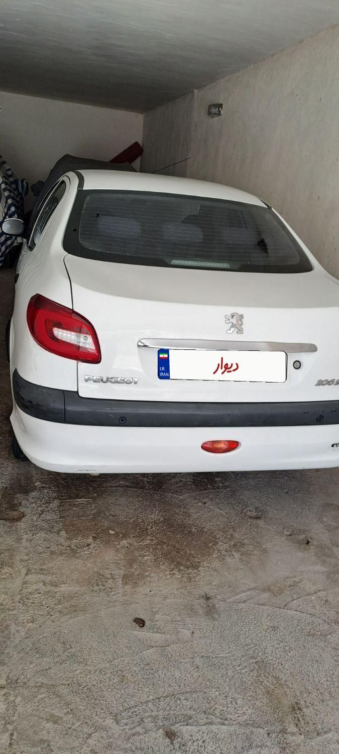 پژو ۲۰۶ صندوق دار v8 - 1393