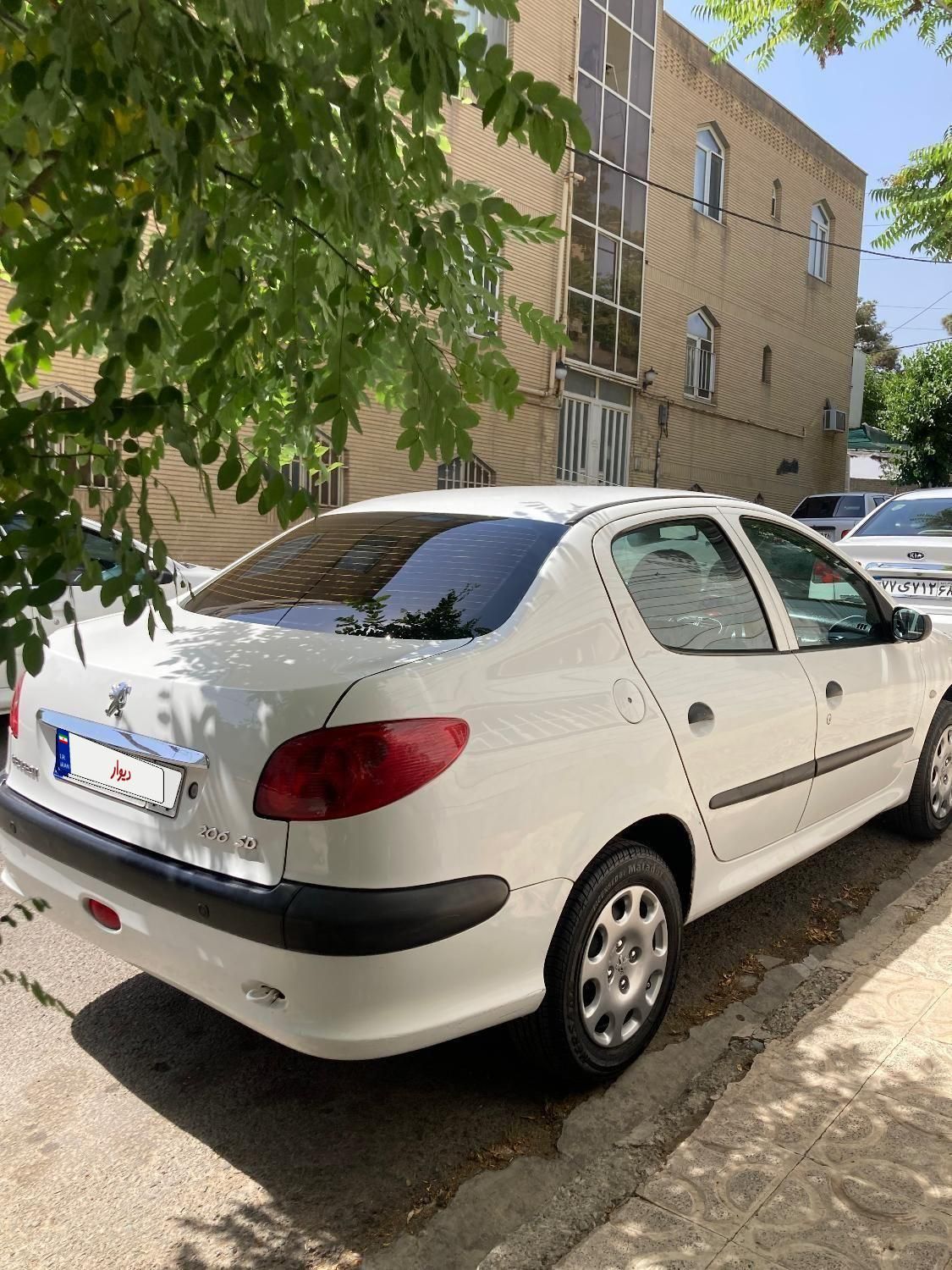 پژو ۲۰۶ صندوق دار v8 - 1396