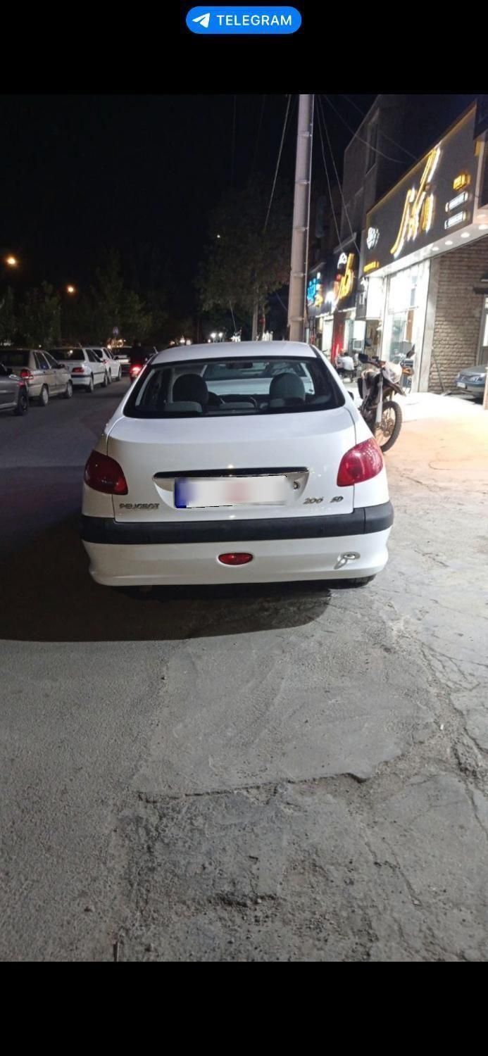 پژو ۲۰۶ صندوق دار v8 - 1396