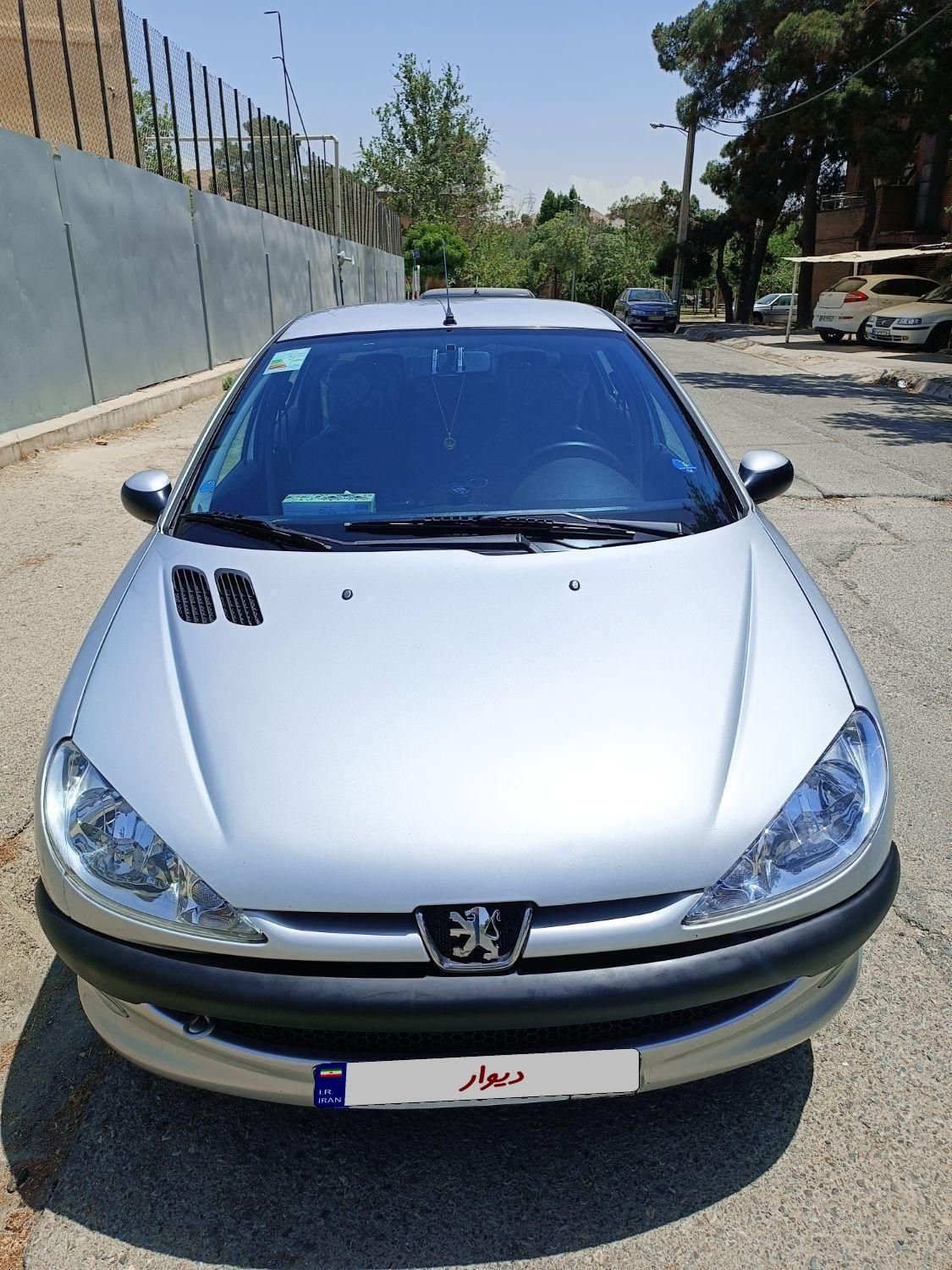 پژو ۲۰۶ صندوق دار v8 - 1394