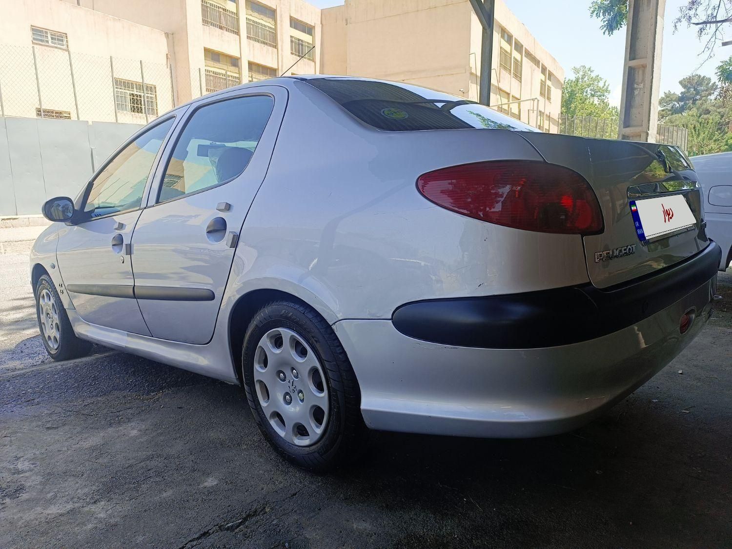 پژو ۲۰۶ صندوق دار v8 - 1394