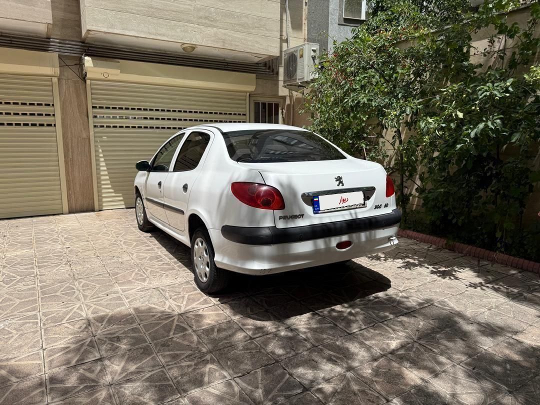 پژو ۲۰۶ صندوق دار v8 - 1395