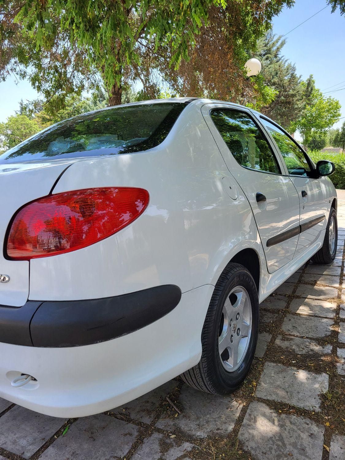 پژو ۲۰۶ صندوق دار v8 - 1396