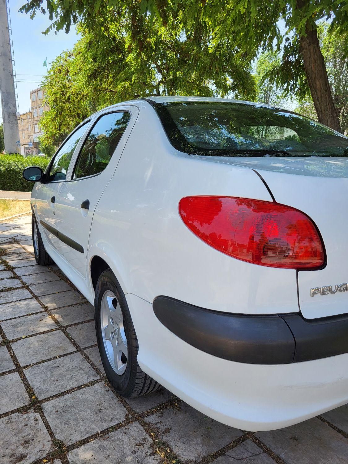 پژو ۲۰۶ صندوق دار v8 - 1396