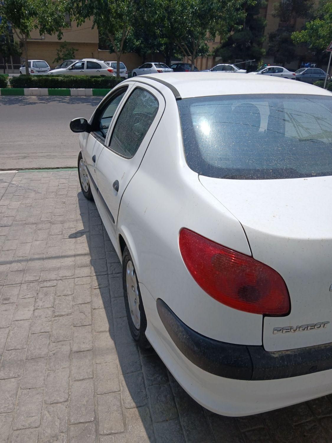 پژو ۲۰۶ صندوق دار v8 - 1396