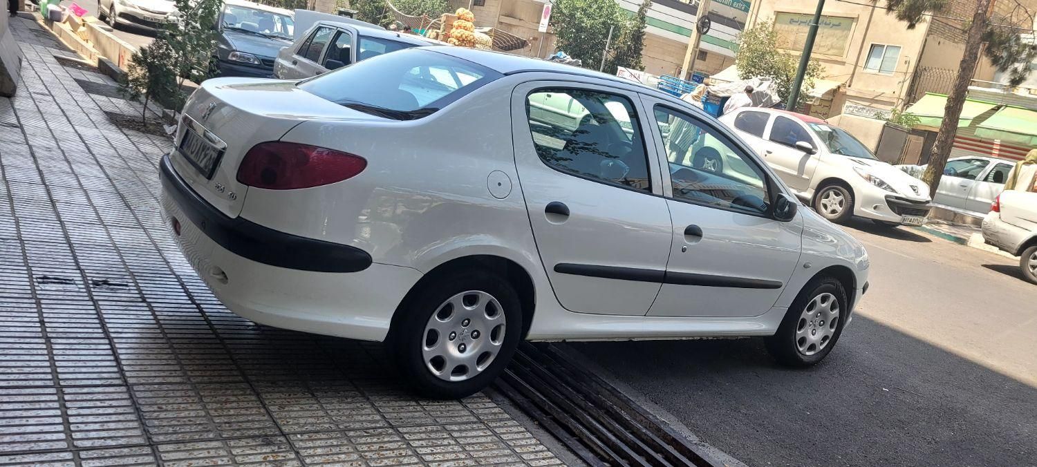 پژو ۲۰۶ صندوق دار v8 - 1395