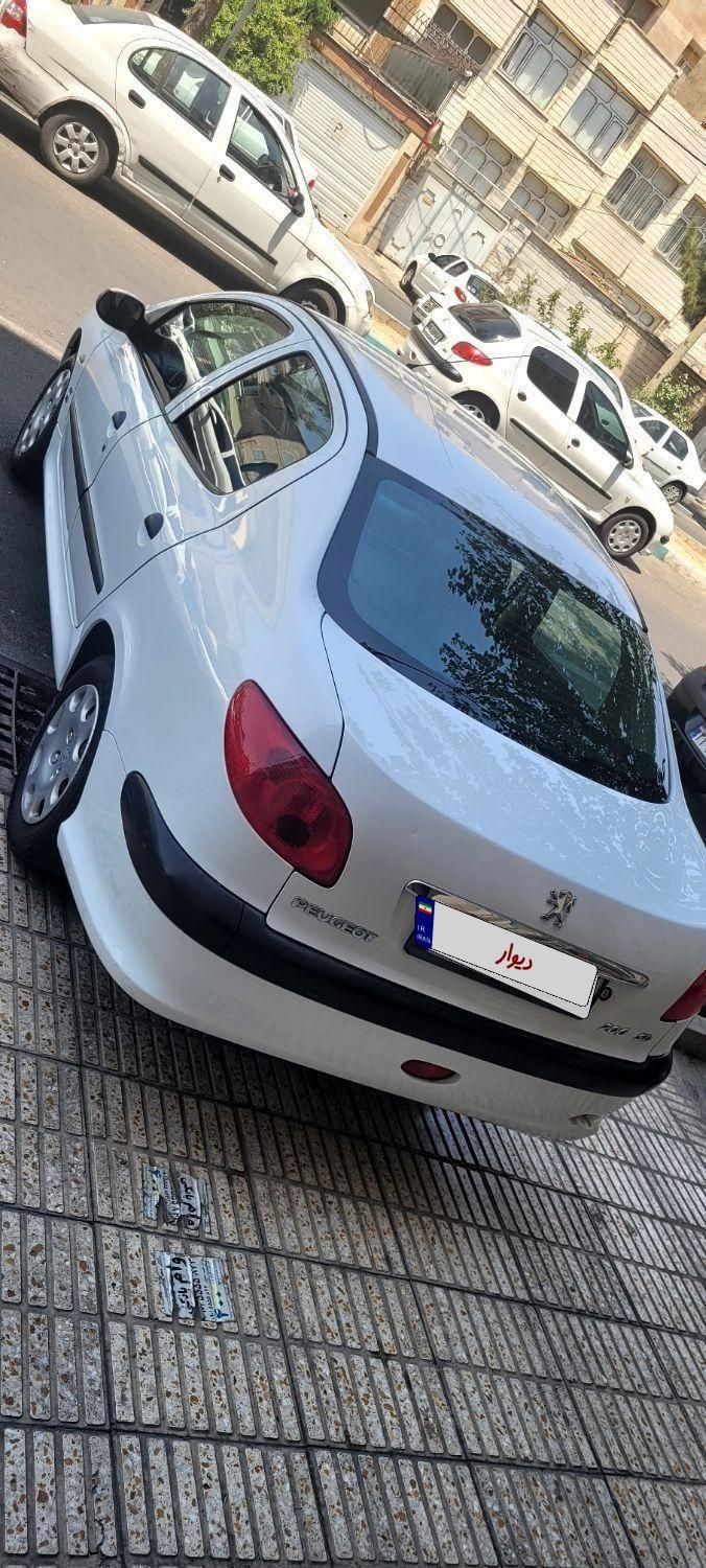 پژو ۲۰۶ صندوق دار v8 - 1395