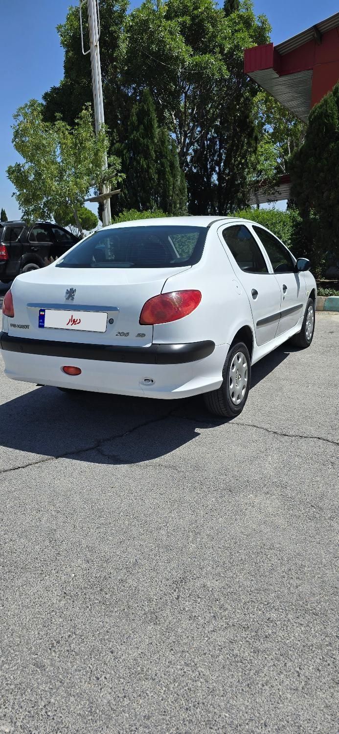 پژو ۲۰۶ صندوق دار v8 - 1394