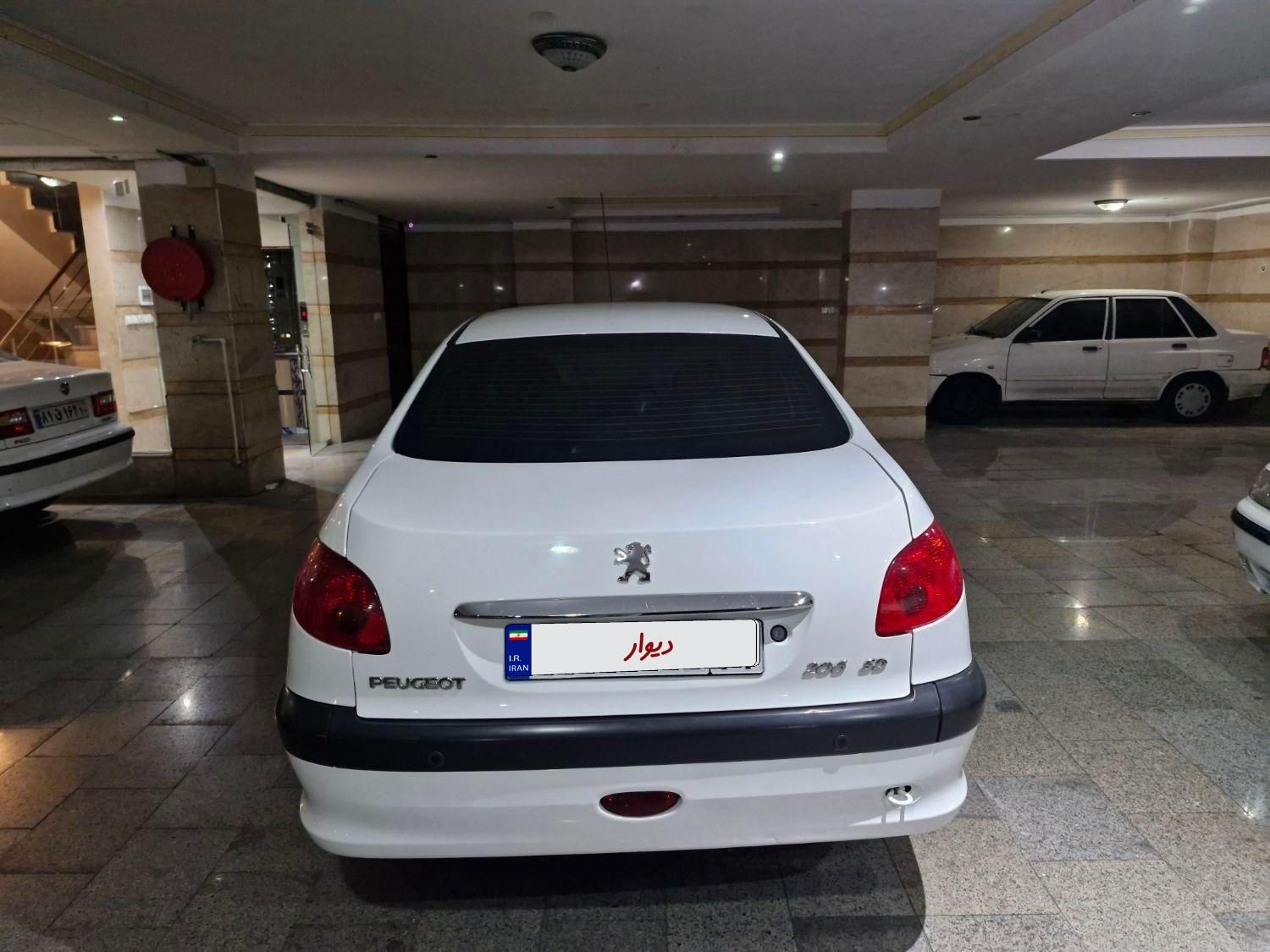 پژو ۲۰۶ صندوق دار v8 - 1396