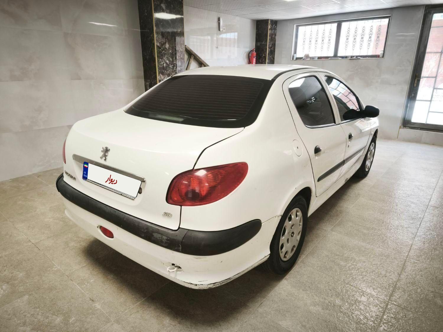 پژو ۲۰۶ صندوق دار v8 - 1395