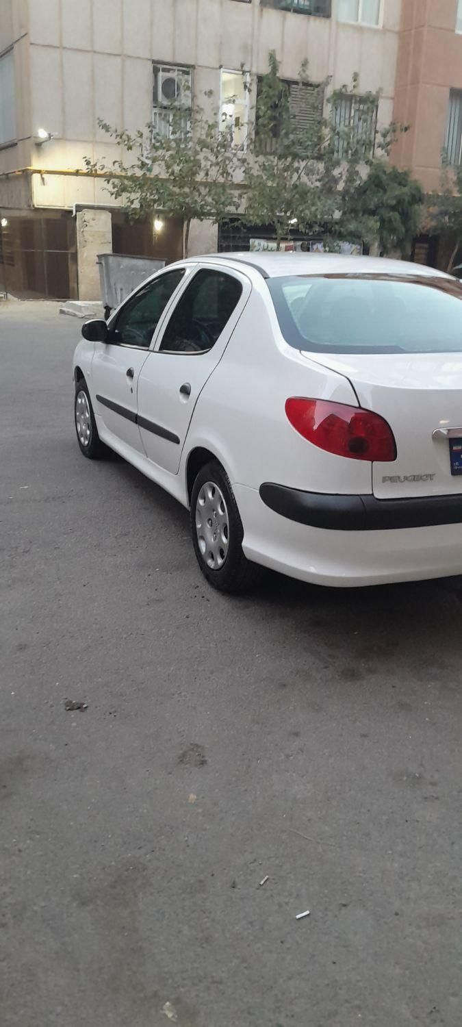 پژو ۲۰۶ صندوق دار v8 - 1394