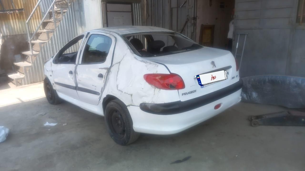 پژو ۲۰۶ صندوق دار v8 - 1394