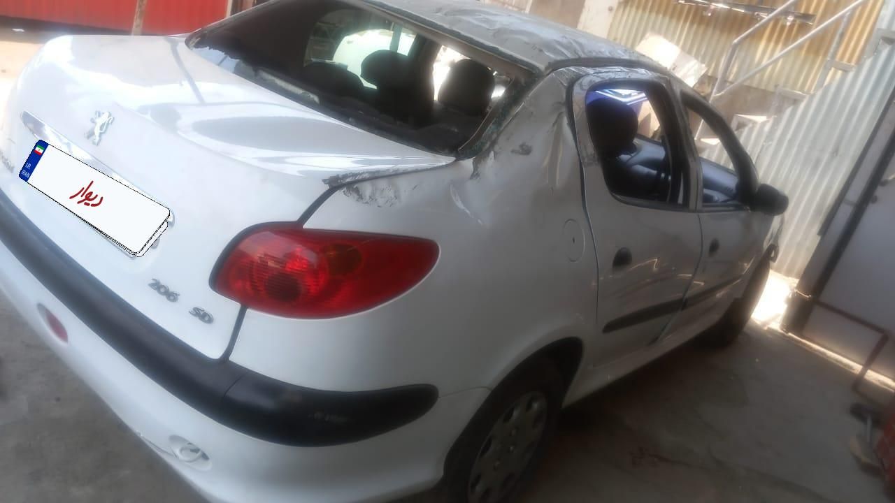 پژو ۲۰۶ صندوق دار v8 - 1394