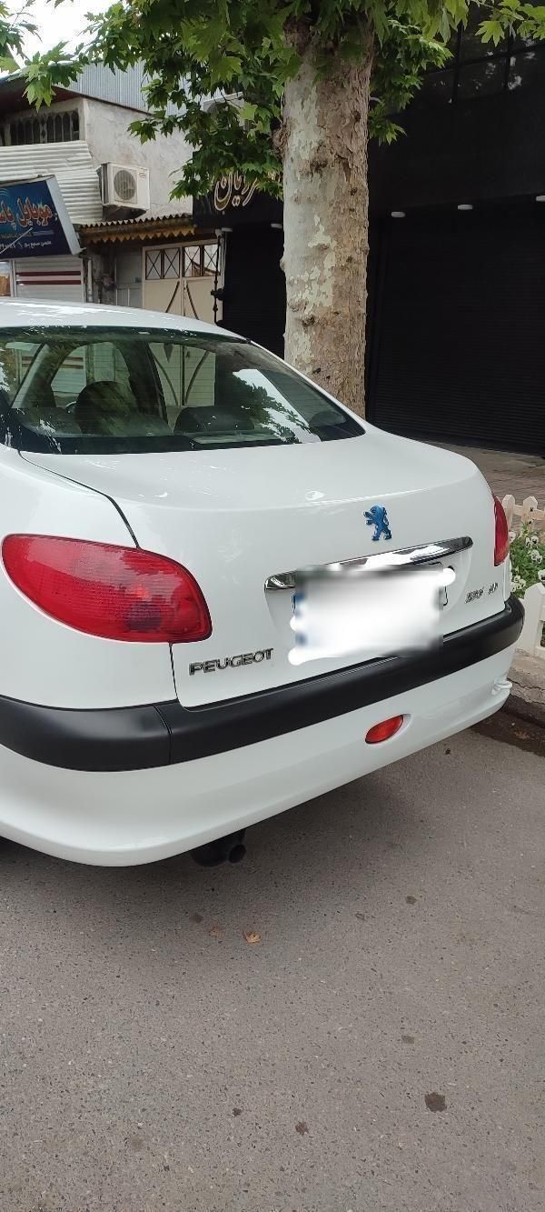پژو ۲۰۶ صندوق دار v8 - 1396