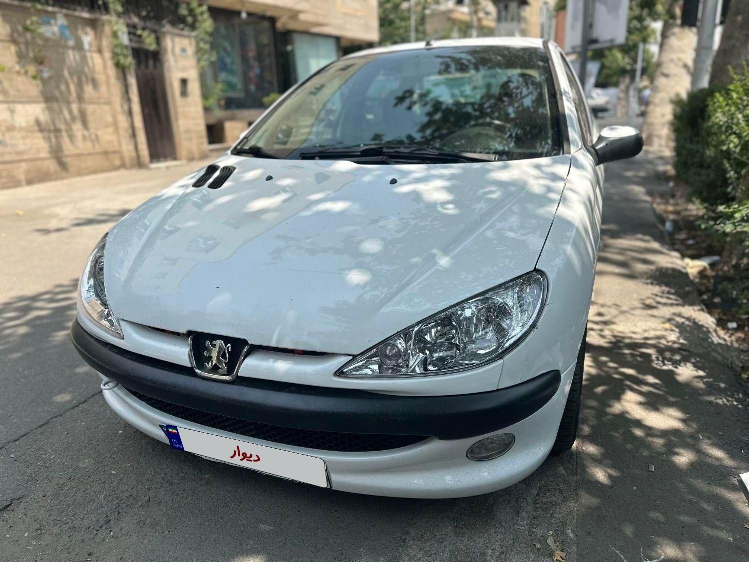 پژو ۲۰۶ صندوق دار v8 - 1394