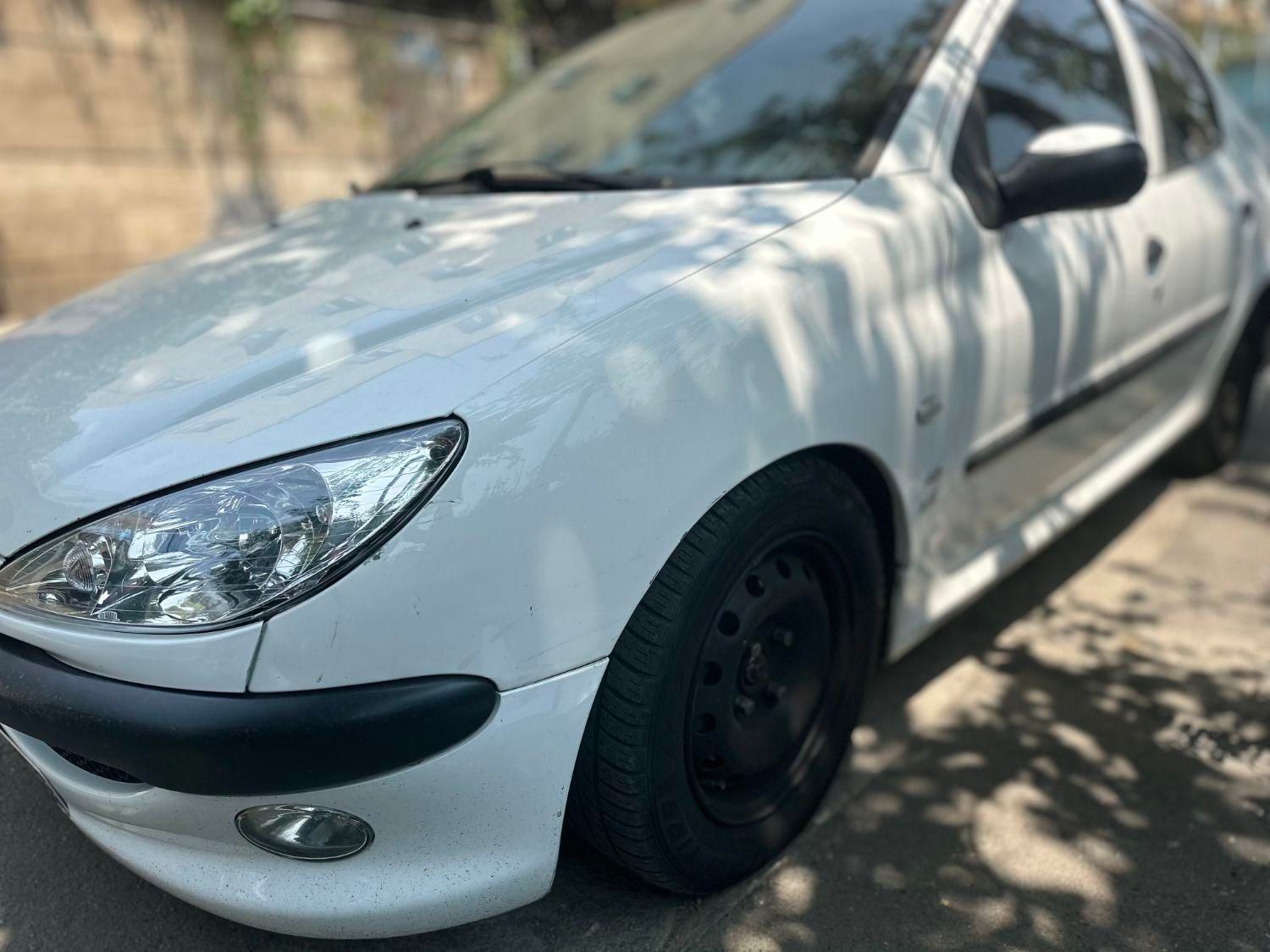 پژو ۲۰۶ صندوق دار v8 - 1394
